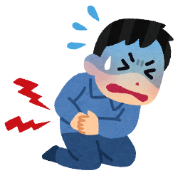 お腹を押さえている人